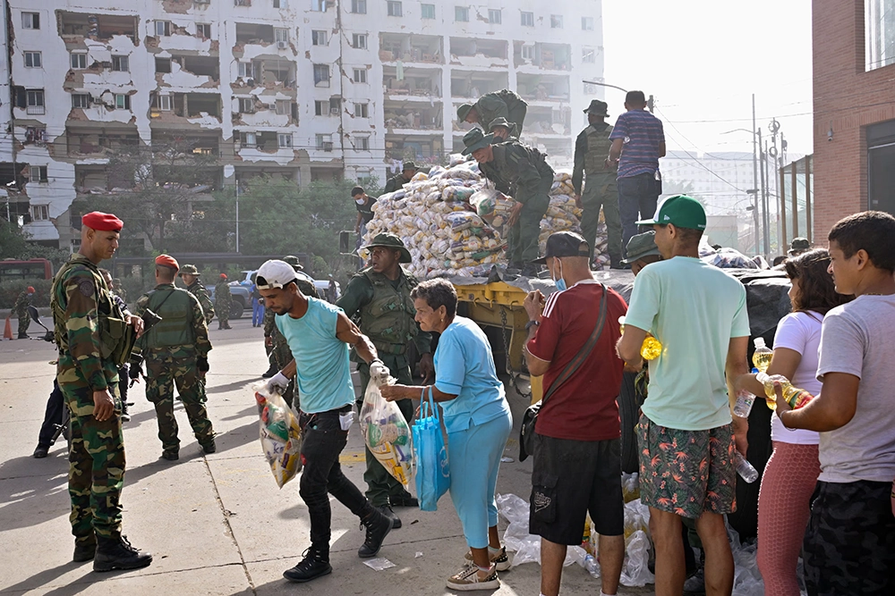 fila de damnificados por el terremoto de Venezuela
